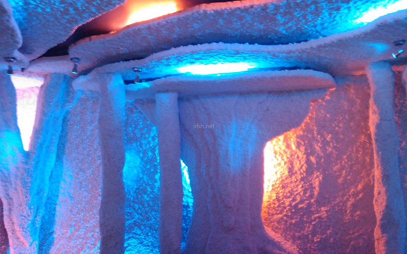 Natural white salt coating on the walls of Halomed salt room is colorfully highlighted